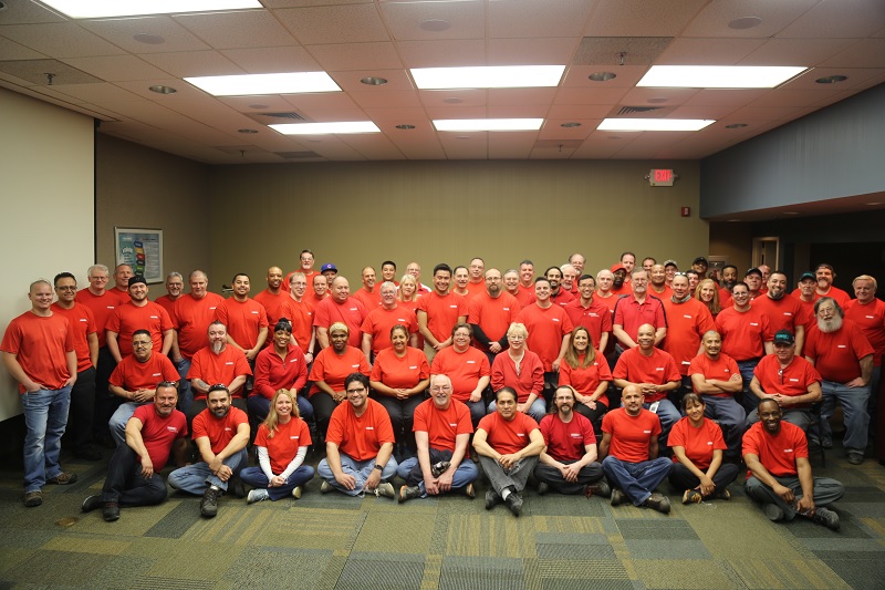 Employees at Flexco’s Downers Grove, Ill. headquarters took a group photo and later sang “Happy Birthday” to Flexco.